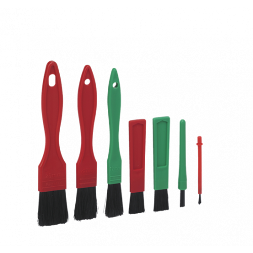 Set of red and green car cleaning brushes on a white background