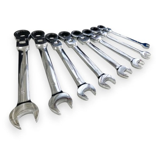 A set of seven chrome combination wrenches in different sizes, arranged diagonally on a plain white background.