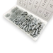 A clear plastic organizer tray filled with many small silver metal springs shown open against a white background. A printed size chart sheet is visible behind the tray.