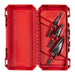 Red Milwaukee tool case with drill bits inside on a white background