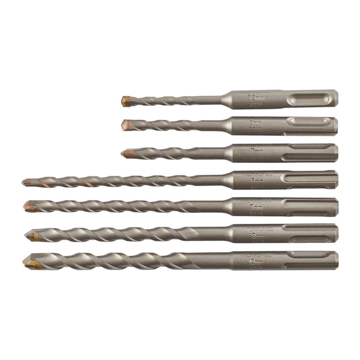 seven sds drill bits on white background