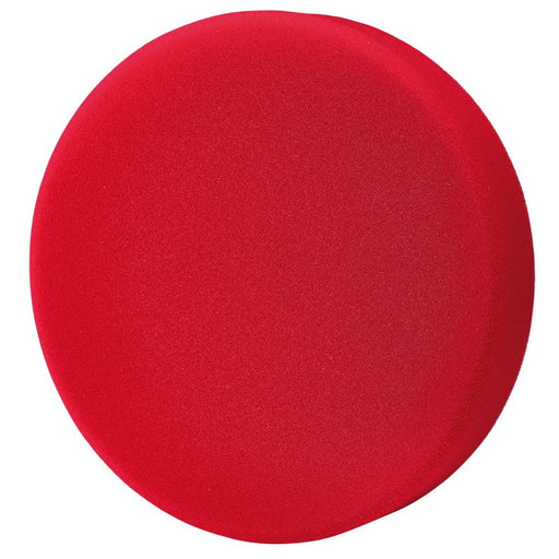 Red polishing sponge on a white background