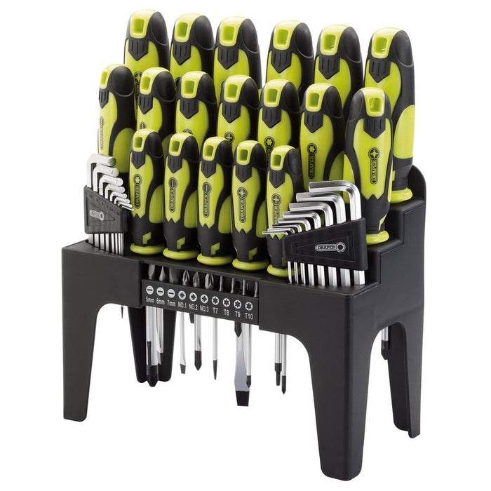 Set of screwdrivers and tools in a black holder on a white background