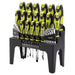Set of screwdrivers and tools in a black holder on a white background
