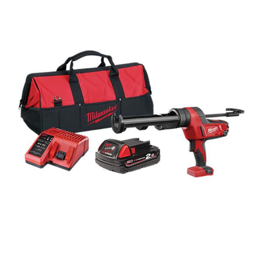 Milwaukee tool set with caulking gun, battery, charger, and bag on a white background