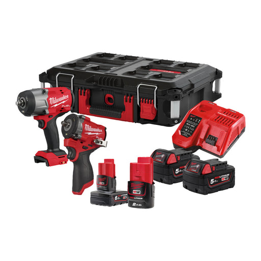Milwaukee tool kit with impact drivers, and batteries on a white background