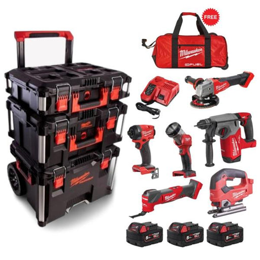 milwaukee kit with various power tools and a packout trolley with a free bag