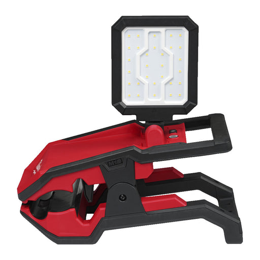 Red and black portable work light on a white background
