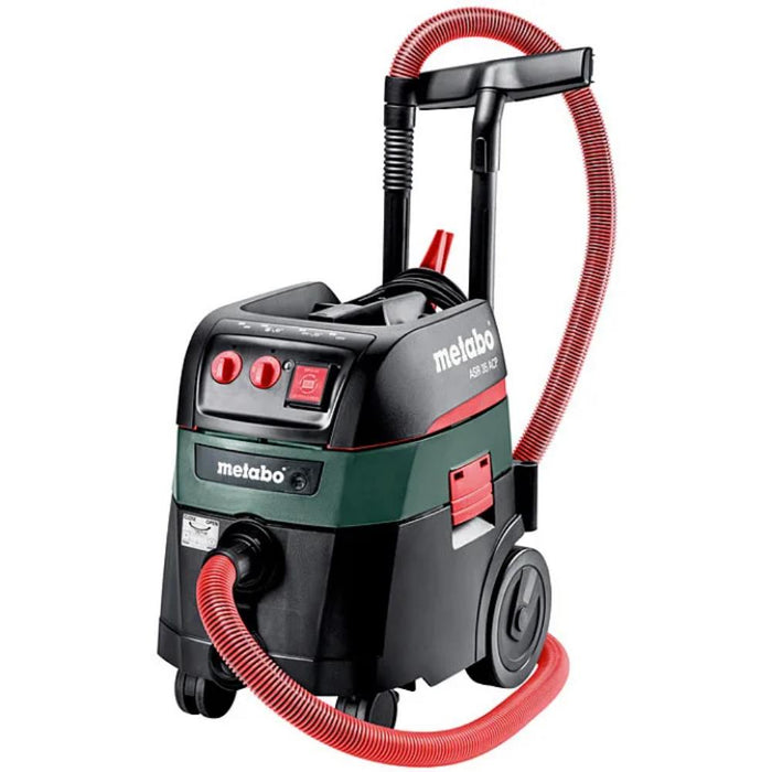 A Metabo cordless vacuum cleaner with a red hose, black and green body, and red power buttons, shown on a white background.