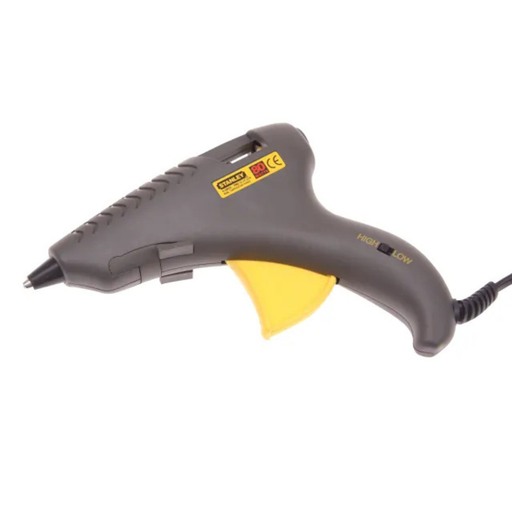 Gray and yellow glue gun on a white background