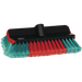 Cleaning brush with red and green bristles on a white background