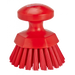 Red scrub brush on a white background
